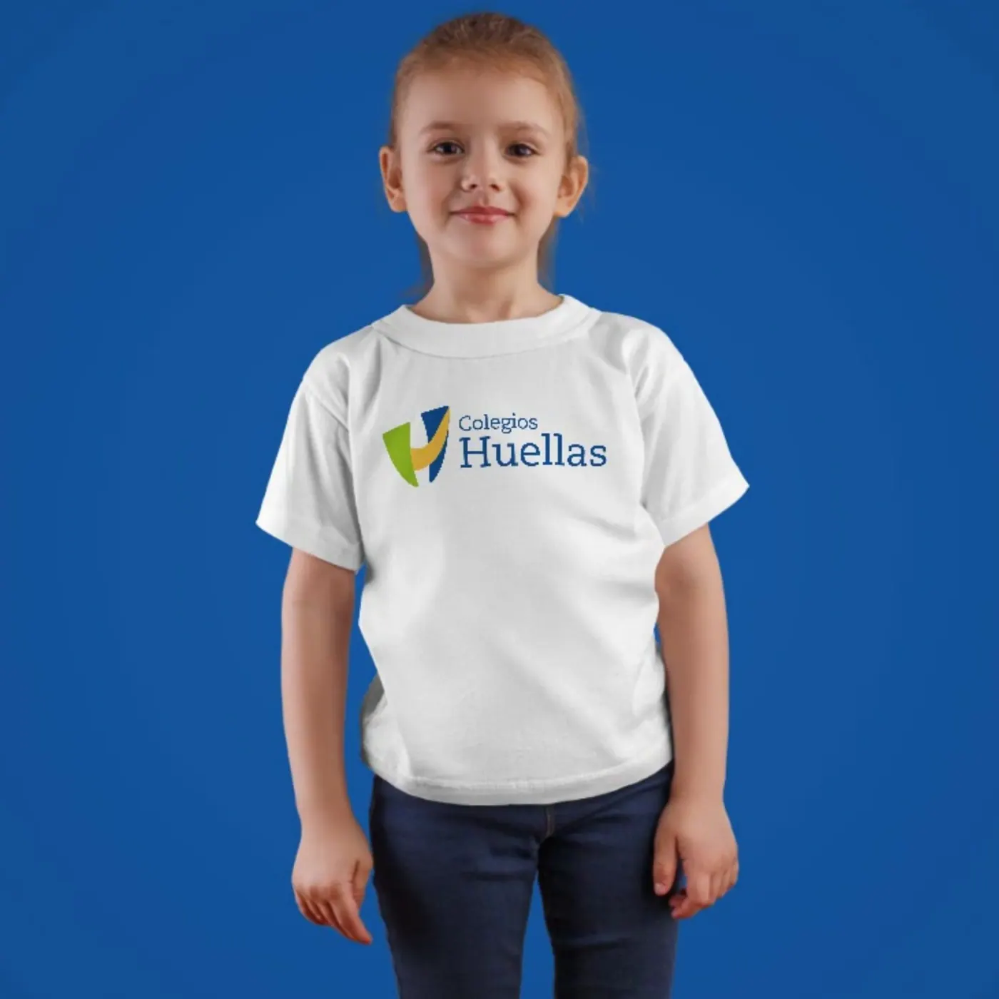 Colegios Huellas · aplicación de marca 2